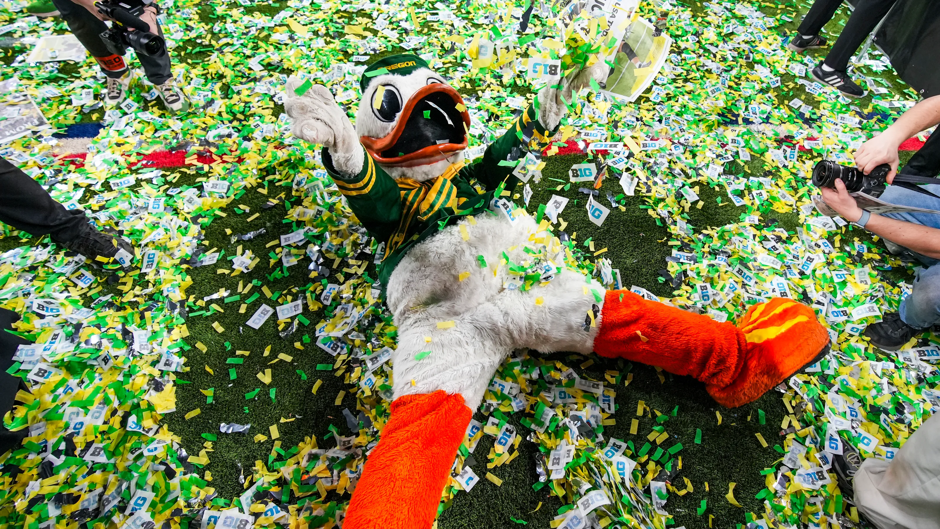 Duck mascot in Big Ten confetti